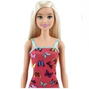 Barbie Fashion Doll with Blonde Hair Dressed in Colorful Butterfly Print Dress